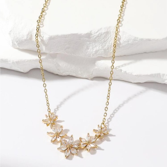 Jewelry - Gold plated stainless steel multi flower necklace